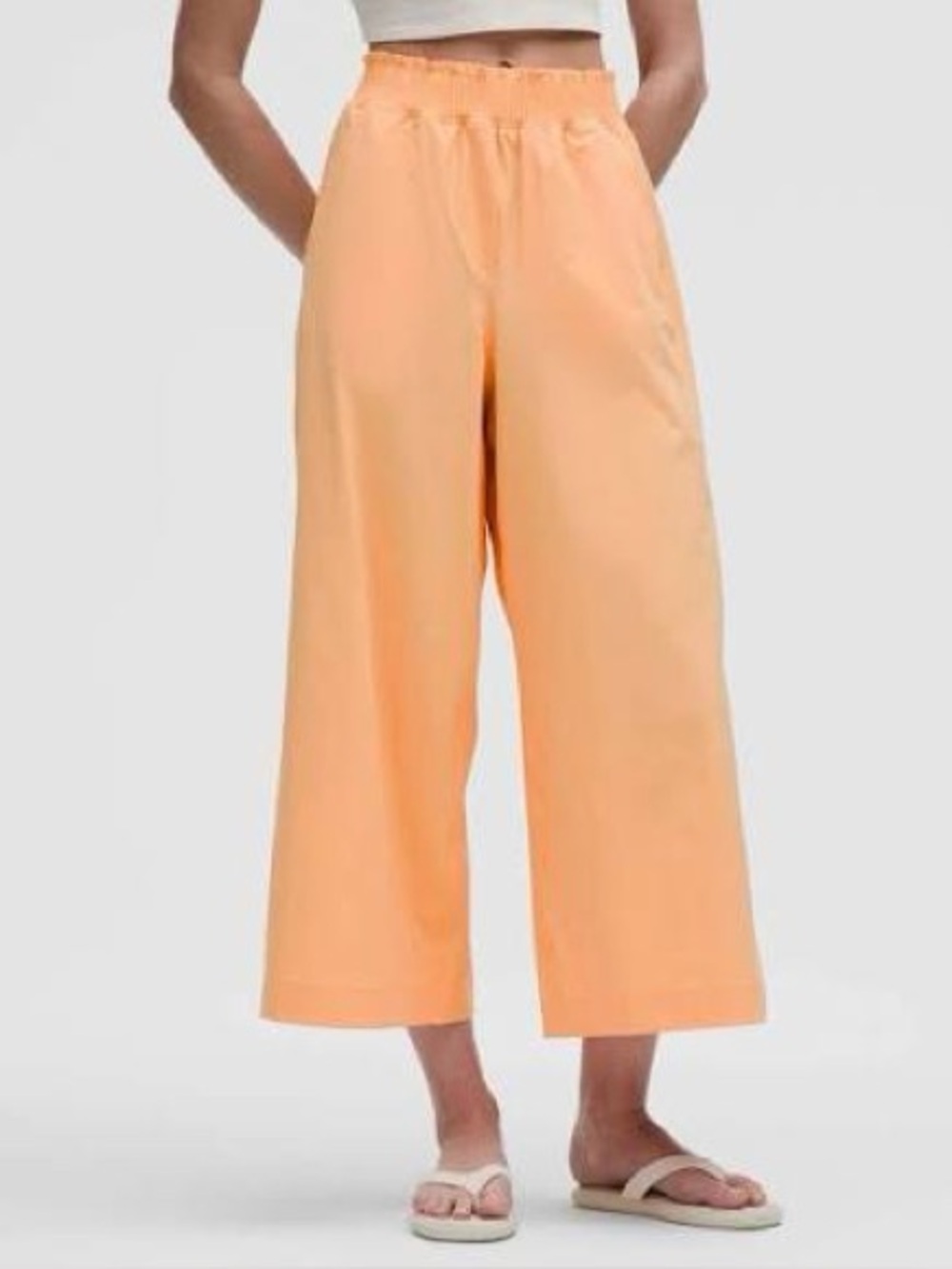 LULULEMON Stretch Woven Ruffle-waist Wide Leg Cropped pants size L | Rock Melon